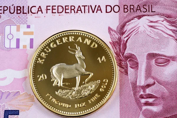 宏观形象的紫色 雷亚尔巴西银行纸币与黄金南非克鲁格 — 图库照片
