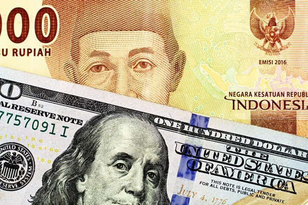Pomarańczowy Pięć Tysięcy Rupia Indonezyjska Banknot Niebieski Sto Amerykańskiego Dolara — Zdjęcie stockowe