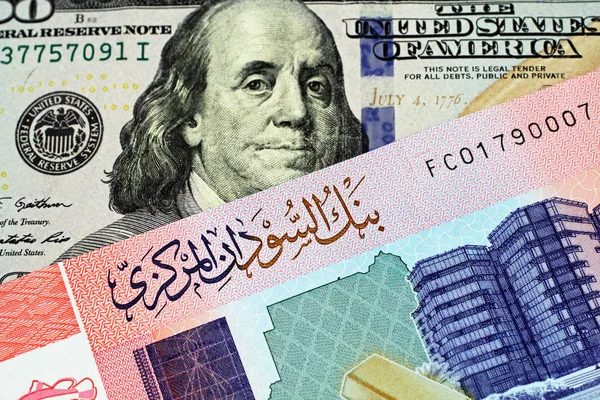 Bliska Wizerunek Amerykańskiego 100 Dolara Banknot Kolorowym Funt Notatki Sudanu — Zdjęcie stockowe