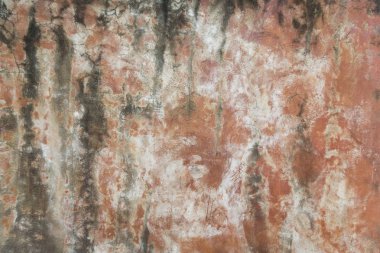 Kirli turuncu beton duvar.