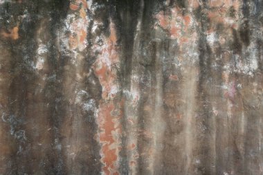 Kirli turuncu beton duvar.