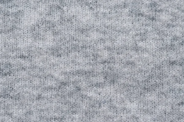 Szürke meleg kötöttáru sima szövet textúra. Közelről. Absztrakt háttér. — Stock Fotó