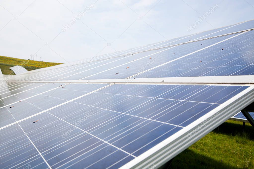 solar panels with the sunny sky. Blue solar panels. background of photovoltaic modules for renewable energy.