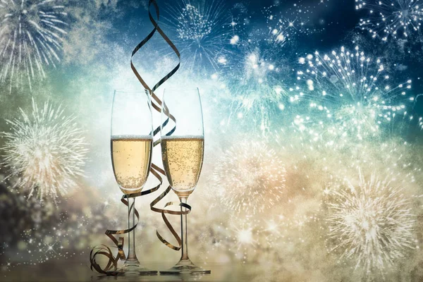 Two Champagne Glasses Ribbons Holiday Lights Fireworks New Year Celebrations — Stock Photo, Image