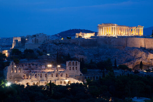 athens seen from Philopapou hill with views to Herodium, Acropolis and the Parthenon at blue hour, Attica, Greece
