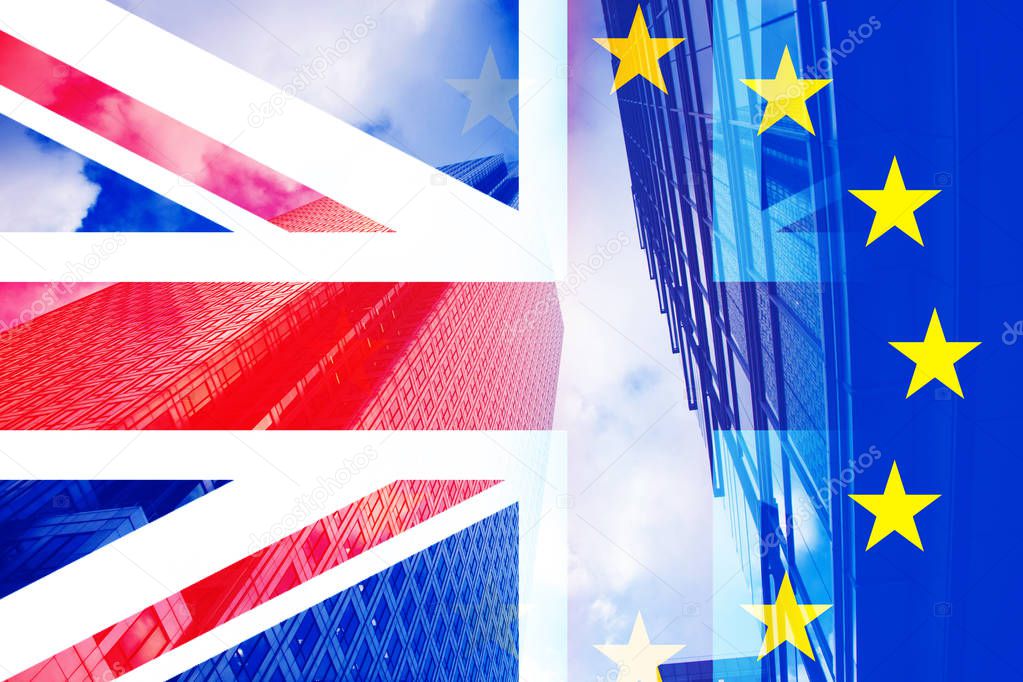 brexit concept - UK economy after Brexit deal - double exposure of flag and Canary Wharf business center skyscrapers