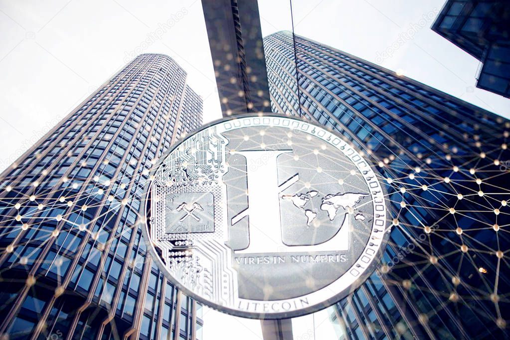 litecoin against skyscrapers - futuristic smart city - cryptocurrency concept
