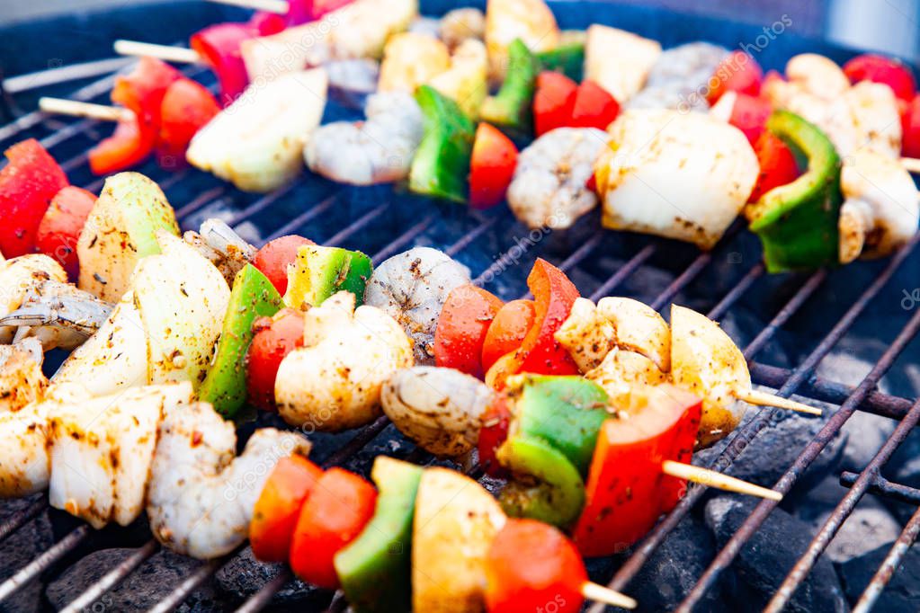 colorful skewers with vegetables and shrimps