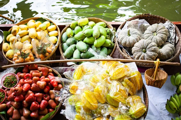 Floating market - top view of boat full of fresh fruits on sale — Stock Photo, Image