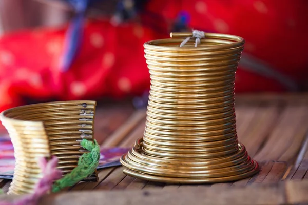 Close up on a neck ring worn by long neck karen women — Stock Photo, Image