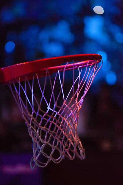 Basketball hoop in red neon lights - game day — Stock Photo, Image