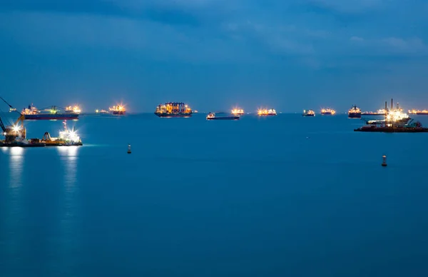 Cargo ships at night — Stock Photo, Image