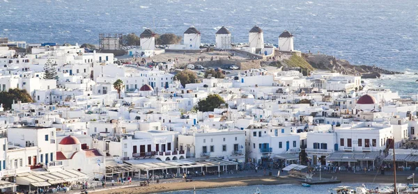 Panoramic view of the Mykonos town harbor with famous windmills — ストック写真