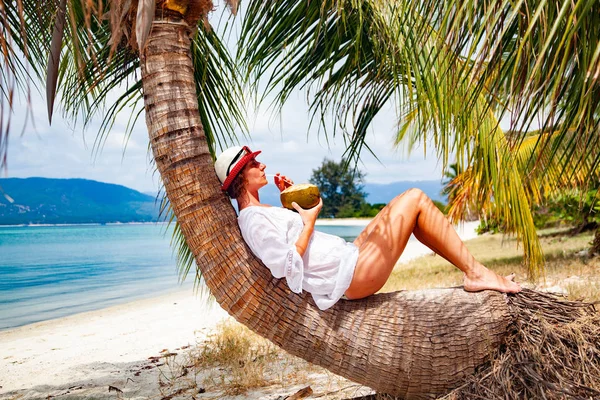 Woman Drinking Coconut Lying Palm Tree Tropical Beach — Stock Photo, Image