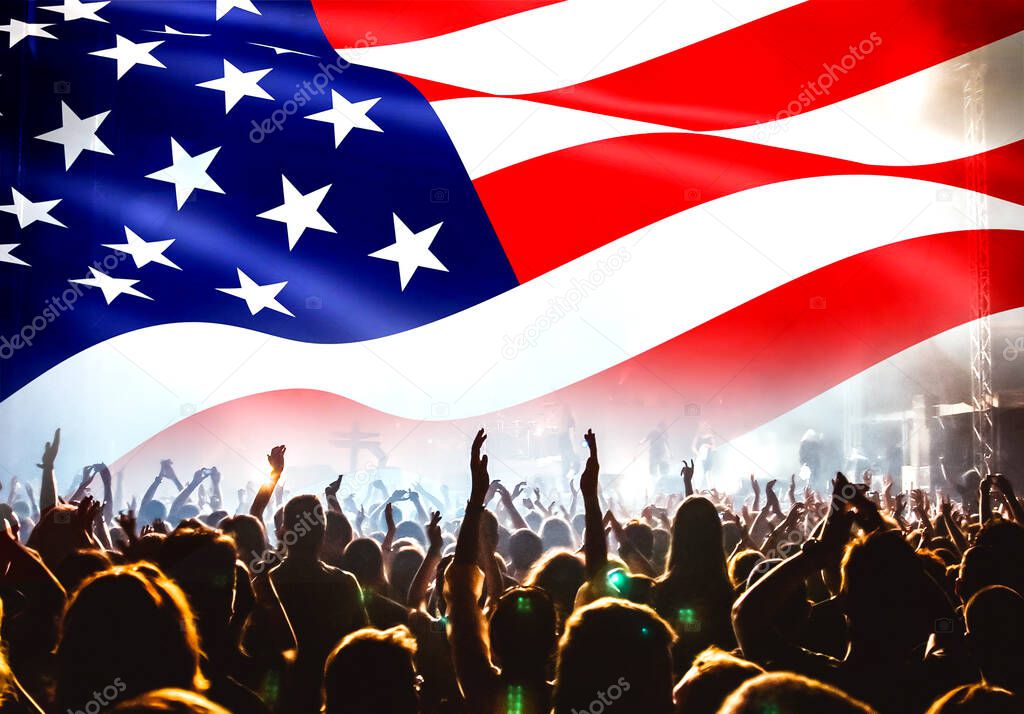 crowd celebrating Independence Day. United States of America USA flag with fireworks background for 4th of July