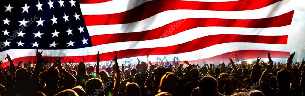 crowd celebrating Independence Day. United States of America USA flag with fireworks background for 4th of July