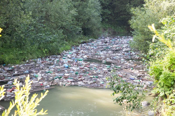 river flooded with plastic pollution background