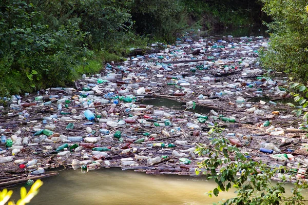 river flooded with plastic pollution background