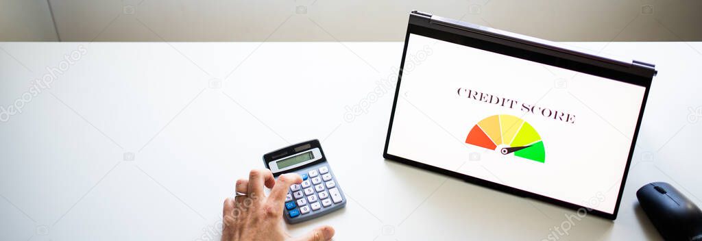 online finances hand pressing credit score button on tablet