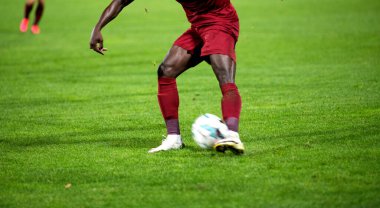 Futbol oyuncularının futbol için savaştığı pankart