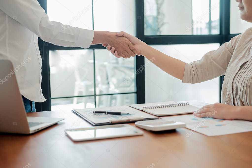 Business confident handshake and business people after discussing , success  concept