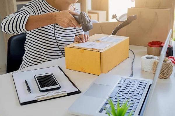 Delivery service courier driver driving with with boxes in hands. Delivery concept.