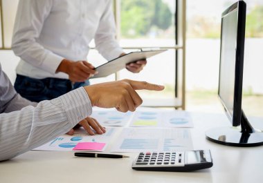 Business adviser analyzing financial figures denoting the progress Internal Revenue Service checking document. Audit concept clipart