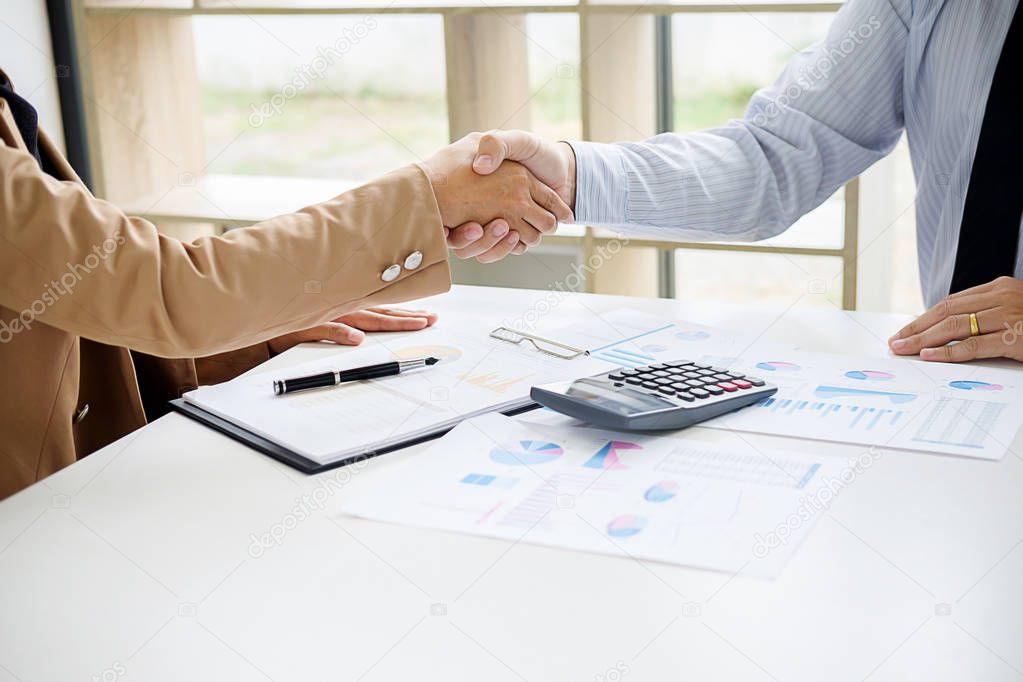 Business confident handshake and business people after discussing , success  concept
