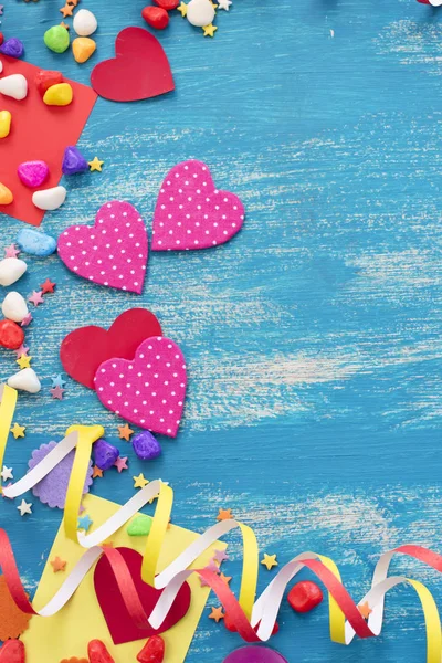 Festive confetti background heart candy color saturated.