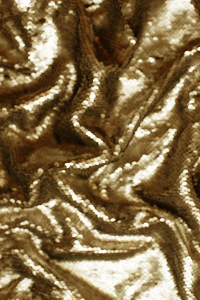 Brilhante textura de fundo festivo de cor dourada brilhante defocus — Fotografia de Stock