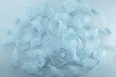 Soyut dokulu gri arka plan Şerit bukleler üst görünüm