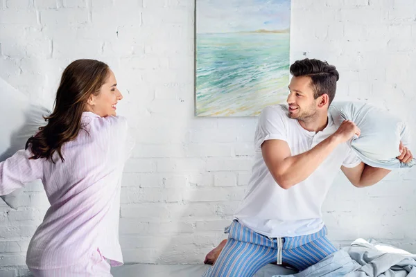 Young Happy Girlfriend Boyfriend Having Pillow Fight Bedroom — Stock Photo, Image