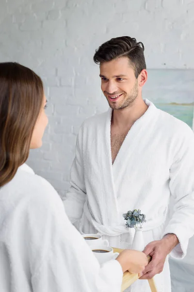 Young Smiling Couple Bathrobes Holding Tray Breakfast Morning — Free Stock Photo