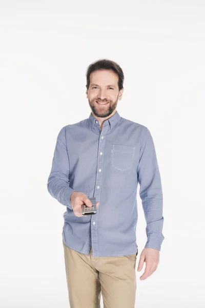 Retrato Hombre Sonriente Con Mando Distancia Mano Aislado Blanco — Foto de Stock