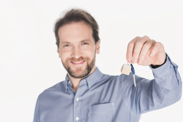 Portrait Smiling Man Showing Key New House Hand Isolated White — Stock Photo, Image