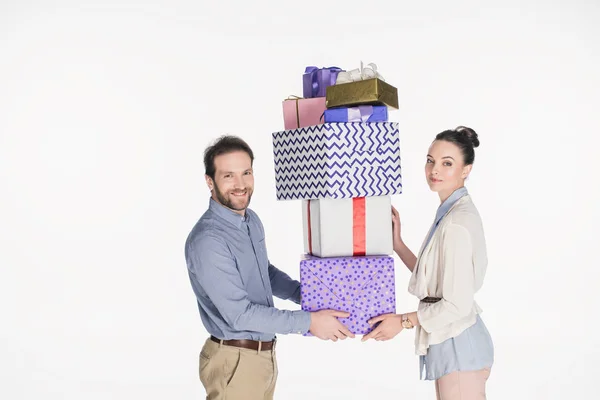 Side View Couple Holding Pile Wrapped Gifts Together Isolated White — Free Stock Photo