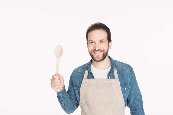 Portrait Smiling Man Apron Wooden Spoon Isolated White — Free Stock Photo