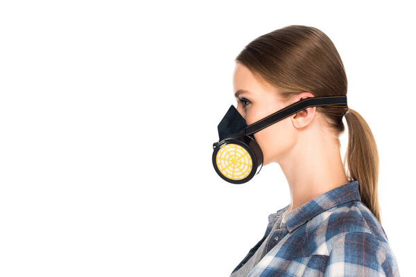 side view of woman in respirator isolated on white background 
