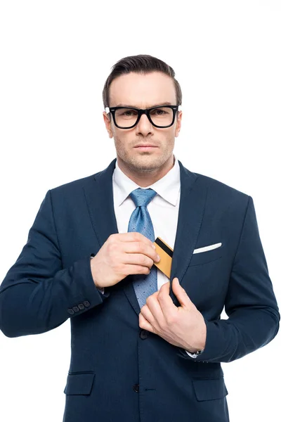 Businessman Eyeglasses Putting Credit Card Suit Jacket Pocket Looking Camera — Stock Photo, Image