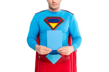 cropped shot of man in superhero costume holding blank box with soap powder isolated on white clipart