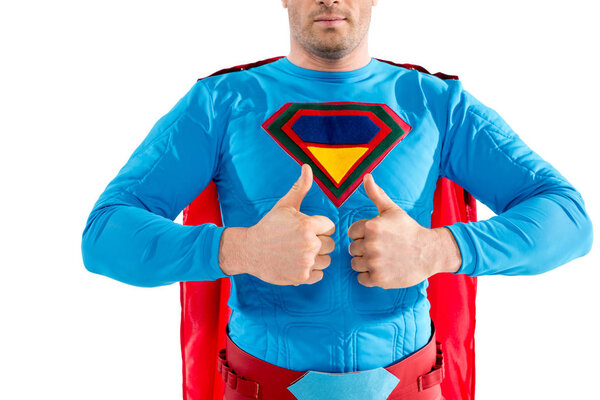 cropped shot of confident superhero showing thumbs up isolated on white