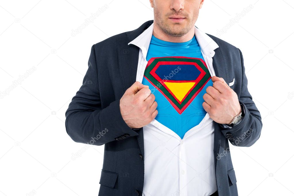 cropped shot of businessman showing superhero costume under suit isolated on white