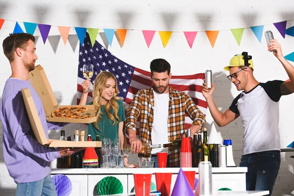 Young Man Holding Boxes Pizza While Friends Drinking Alcoholic Beverages — Stock Photo, Image