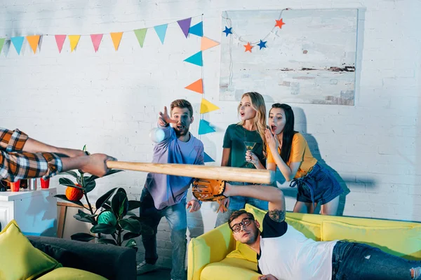 Cropped Shot Young Friends Playing Baseball Home Party — Free Stock Photo