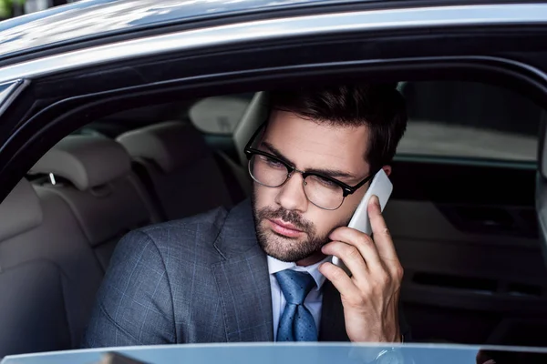 Portrait Businessman Talking Smartphone Backseat Car — Stock Photo, Image