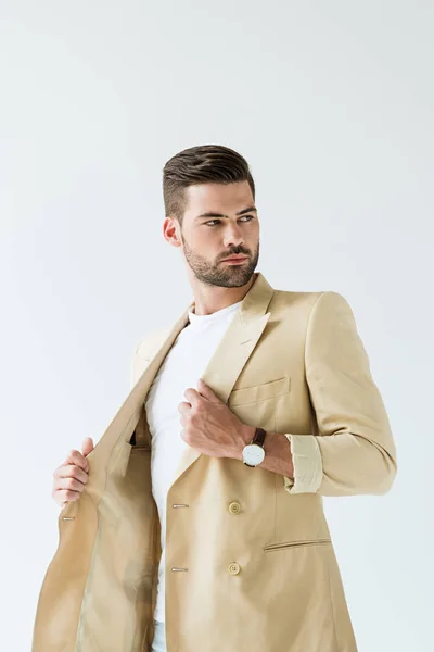 Handsome Bearded Man Straightening His Jacket Isolated White Background — Free Stock Photo