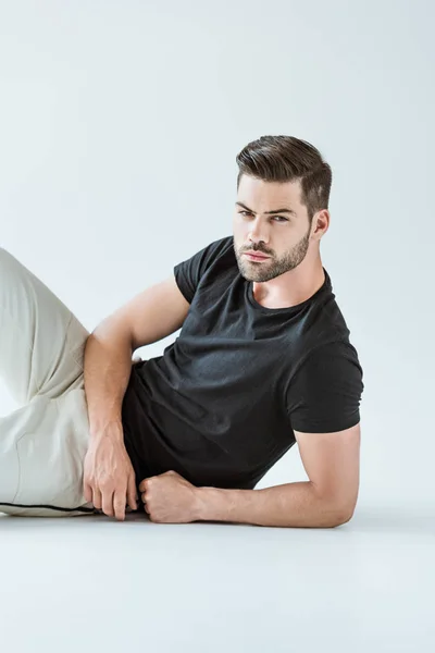 Handsome Bearded Man Resting Floor White Background — Free Stock Photo