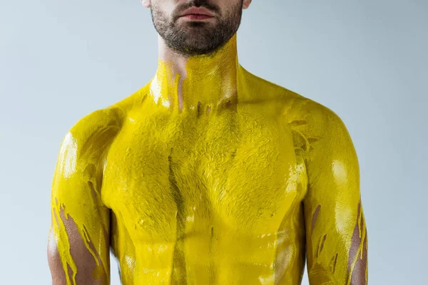 Männlicher Körper Mit Gelber Farbe Befleckt Isoliert Auf Weißem Hintergrund — Stockfoto