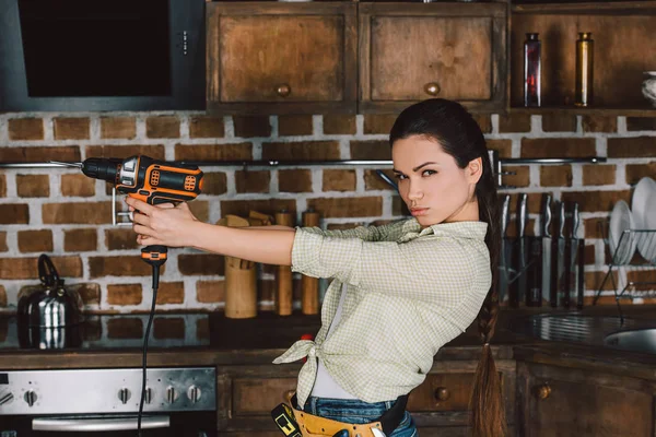 Attractive Young Repairwoman Holding Power Drill Gun — Stock Photo, Image