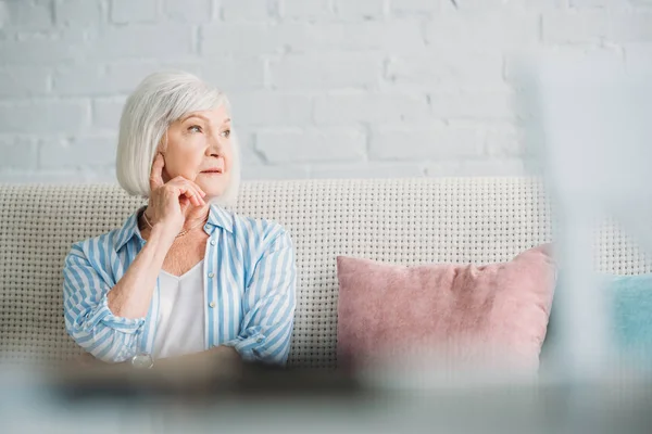 Portrait Pensive Grey Hair Woman Looking Away Resting Sofa Home — Stock Photo, Image